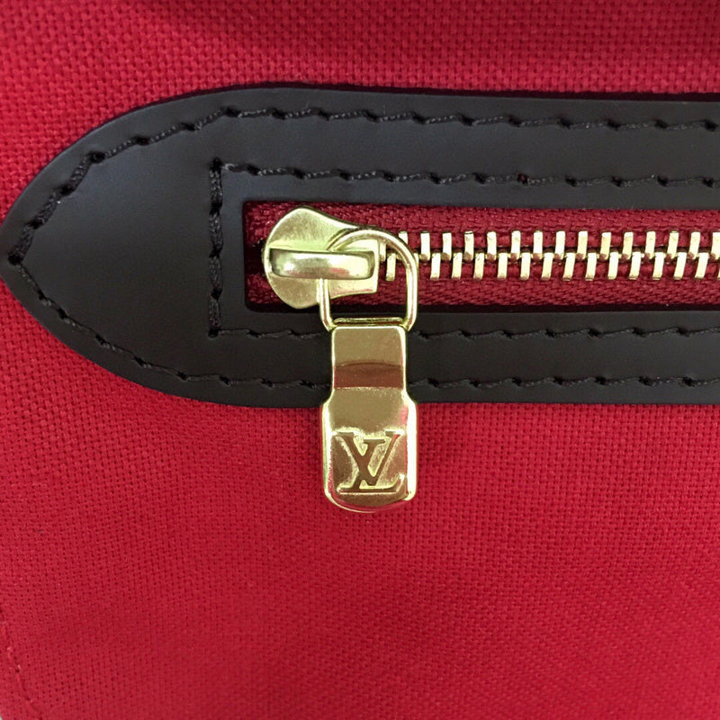 Front view of classic polished women's handbag – women's luxury handbag