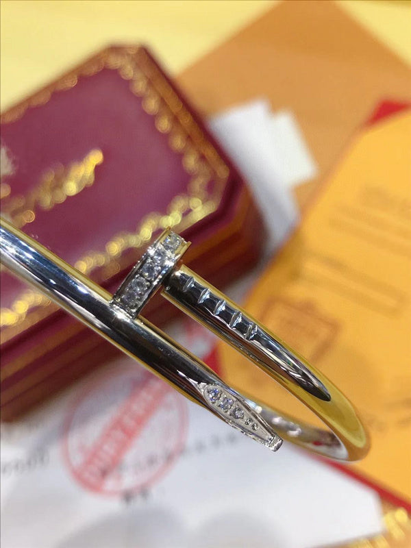 Side view of Cartier unisex jewelry piece