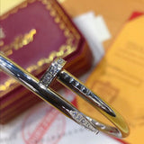 Side view of Cartier unisex jewelry piece