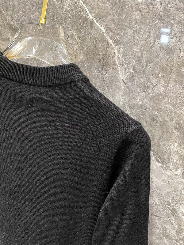 Side profile of Louis Vuitton luxury clothing with label-forward styling