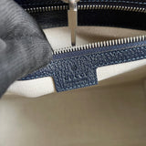 Side profile of chic statement women's handbag – women's luxury handbag