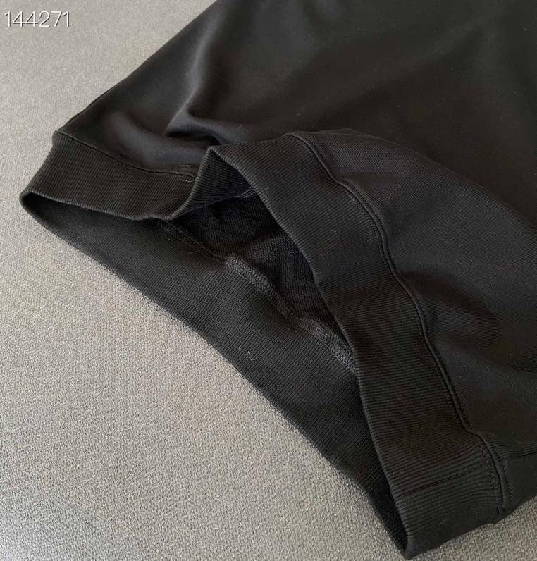 Full styled look of Louis Vuitton luxury clothing with everyday silhouette