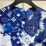 Close-up detail shot of Louis Vuitton cotton t-shirt with signature branding