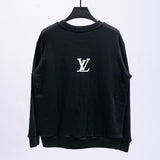Side profile of Louis Vuitton luxury clothing with label-forward styling