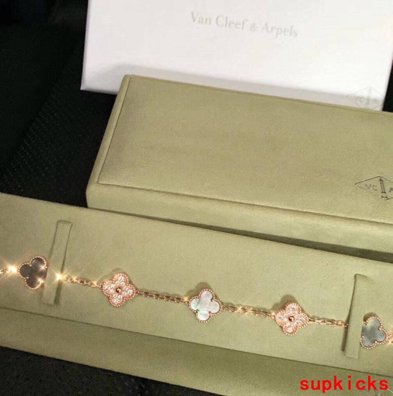 Lifestyle view of Van Cleef & Arpels unisex jewelry piece