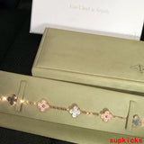 Lifestyle view of Van Cleef & Arpels unisex jewelry piece