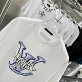 Close-up detail shot of Louis Vuitton cotton t-shirt with monogram-inspired silhouette