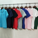 Side profile of Lacoste luxury clothing with signature branding