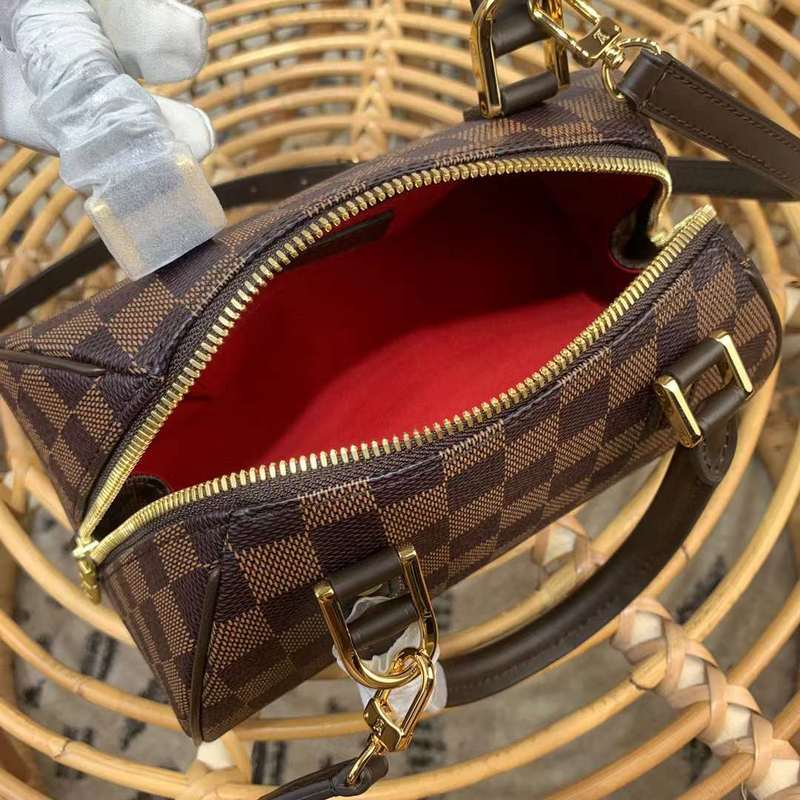 Front view of elevated polished women's handbag – women's luxury accessory