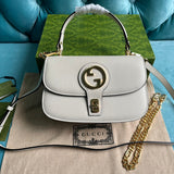 Side profile of polished modern women's handbag – women's everyday handbag