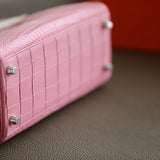 Side view of polished structured handbag