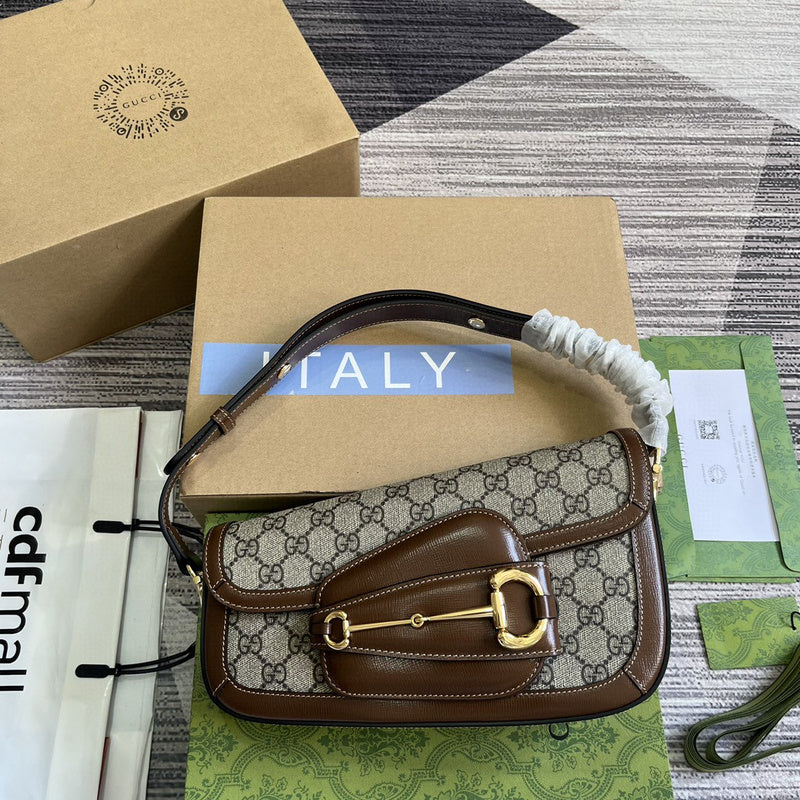 Side profile of structured polished women's handbag – women's designer-style accessory