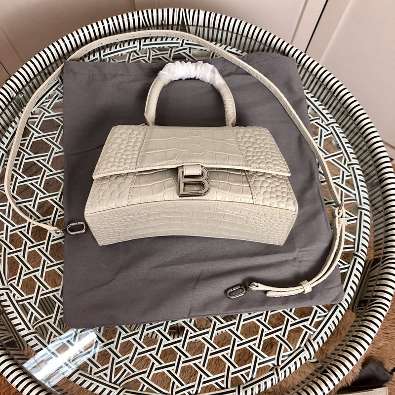 Back view of modern polished women's handbag – women's designer-style accessory