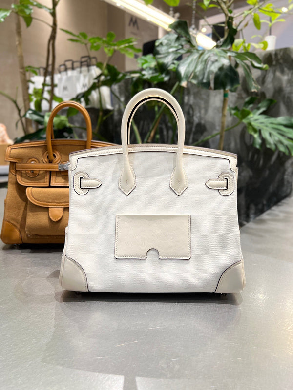 Side view of contemporary structured handbag