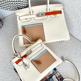 Side view of curated structured handbag