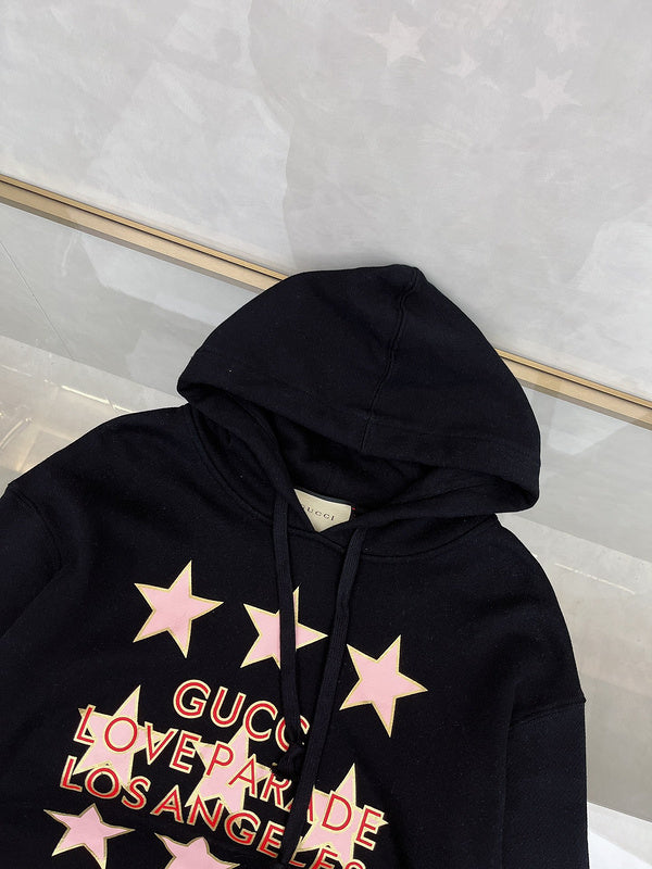 Side profile of Gucci luxury clothing with logo-detail design