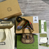 Front view of structured signature women's handbag – women's statement bag