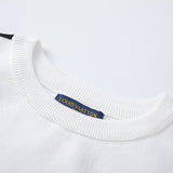 Close-up detail shot of Louis Vuitton luxury clothing with runway-inspired design