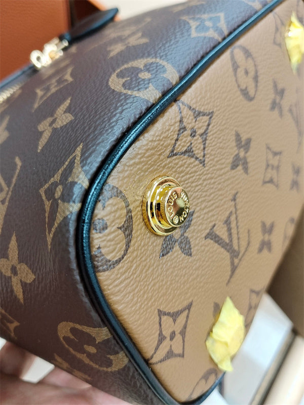  Understated structured bag carried on shoulder