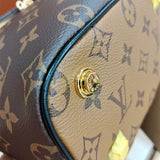  Understated structured bag carried on shoulder