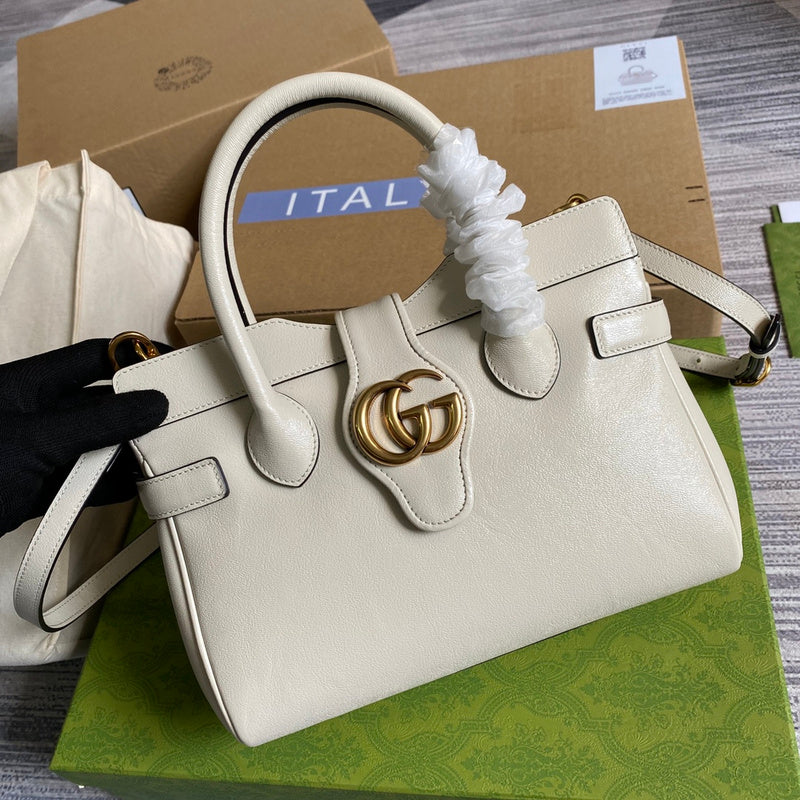 Styled lifestyle shot of sleek statement women's handbag – women's everyday handbag