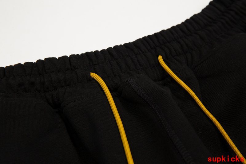 Close-up detail shot of Rhude luxury clothing with contemporary cut