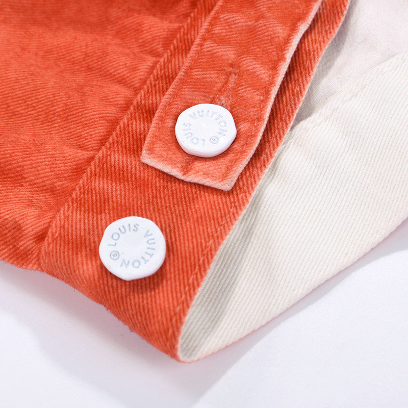 Flat lay presentation of Louis Vuitton luxury clothing with contemporary cut