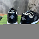 Gucci tonal black luxury sneakers view 10 bold athletic profile