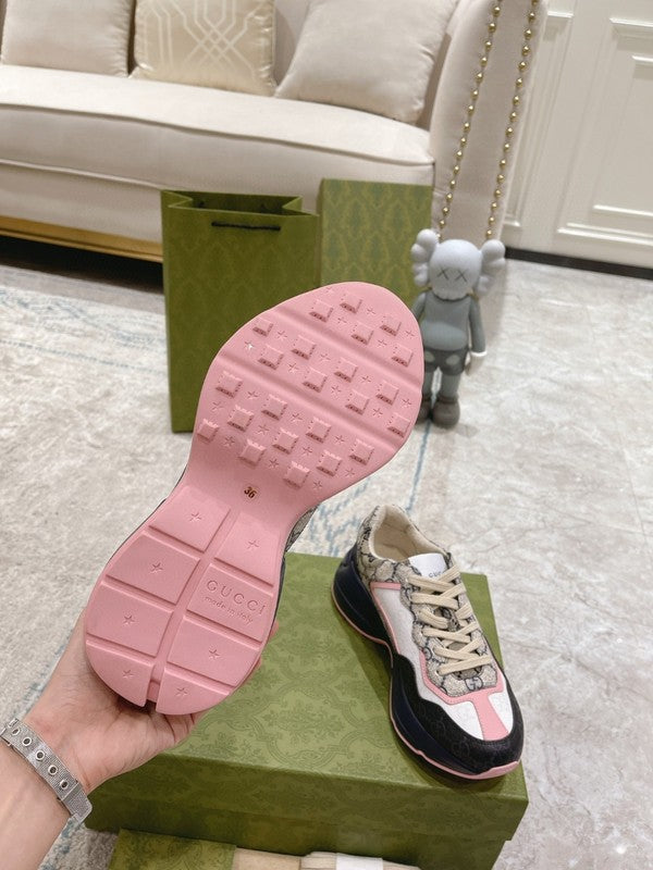 Side profile of Gucci two-tone sneakers sleek tonal finish