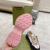 Side profile of Gucci two-tone sneakers sleek tonal finish