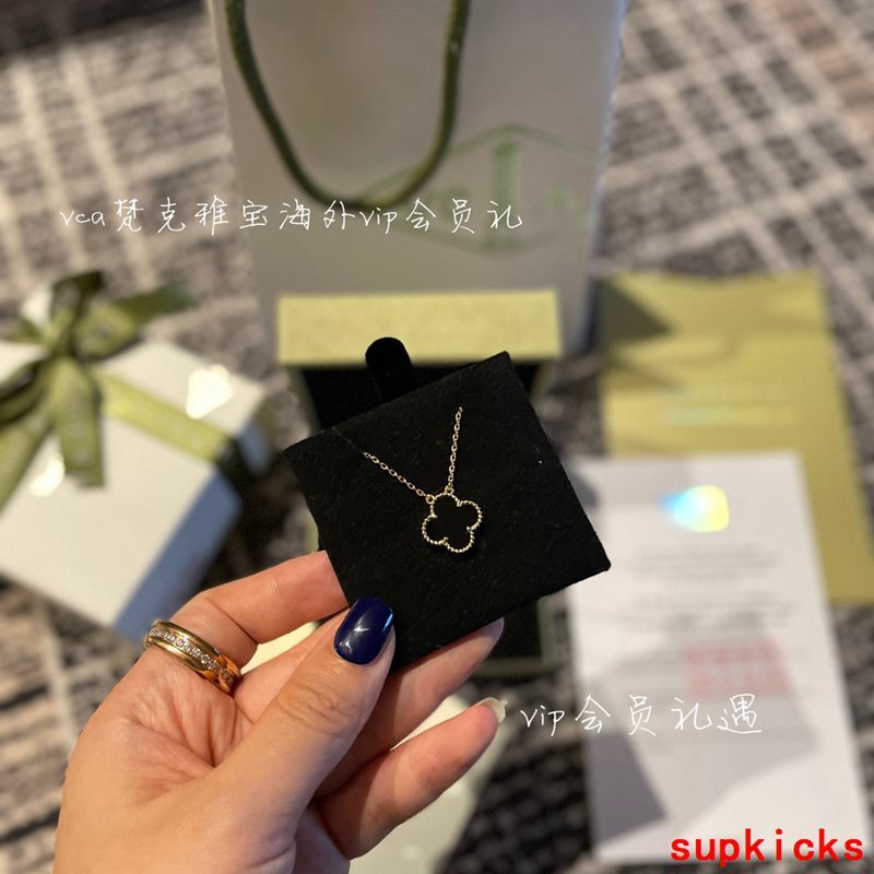 Lifestyle view of Van Cleef & Arpels unisex jewelry piece