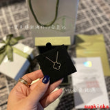 Lifestyle view of Van Cleef & Arpels unisex jewelry piece