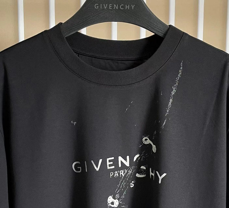 Close-up detail shot of Givenchy luxury clothing with logo-detail design