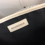 Side profile of modern sleek women's handbag – women's designer-style accessory