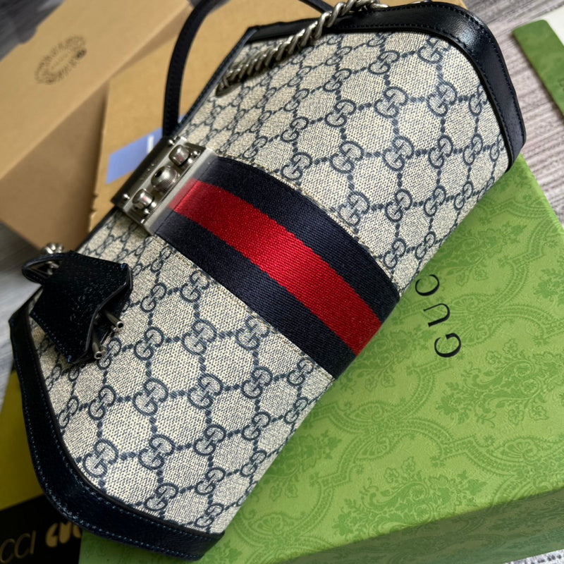 Styled lifestyle shot of sleek statement women's handbag – women's everyday handbag