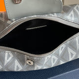 Styled lifestyle shot of refined classic women's handbag – women's designer-style accessory