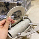 Handle and strap detail of everyday-luxe structured women's handbag – women's everyday handbag