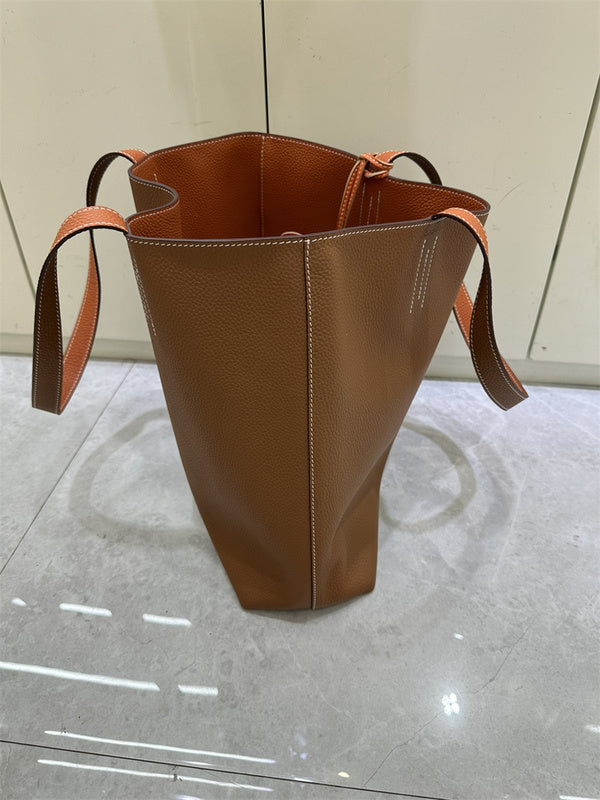 Side view of considered structured handbag