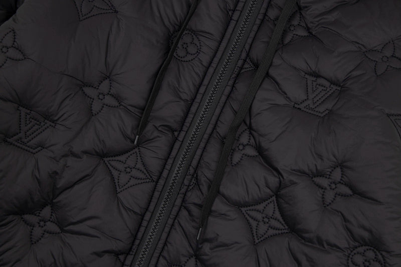 Close-up detail shot of Louis Vuitton luxury clothing with monogram-inspired silhouette