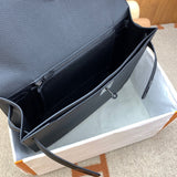 Side view of statement structured handbag