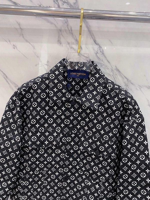 Full styled look of Louis Vuitton luxury clothing with label-forward styling