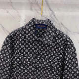 Full styled look of Louis Vuitton luxury clothing with label-forward styling