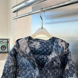Back view of Louis Vuitton luxury clothing with signature branding