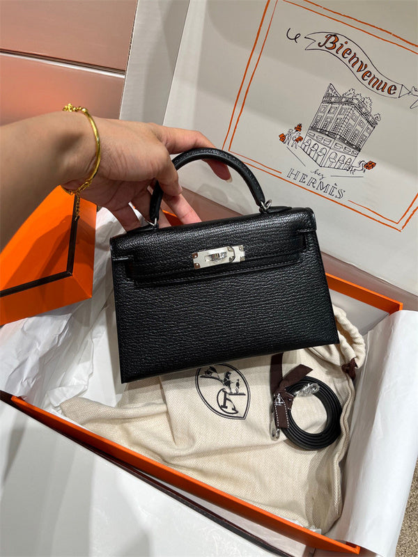  Understated structured bag carried on shoulder
