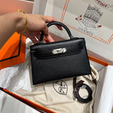  Understated structured bag carried on shoulder