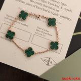 Lifestyle view of Van Cleef & Arpels unisex jewelry piece