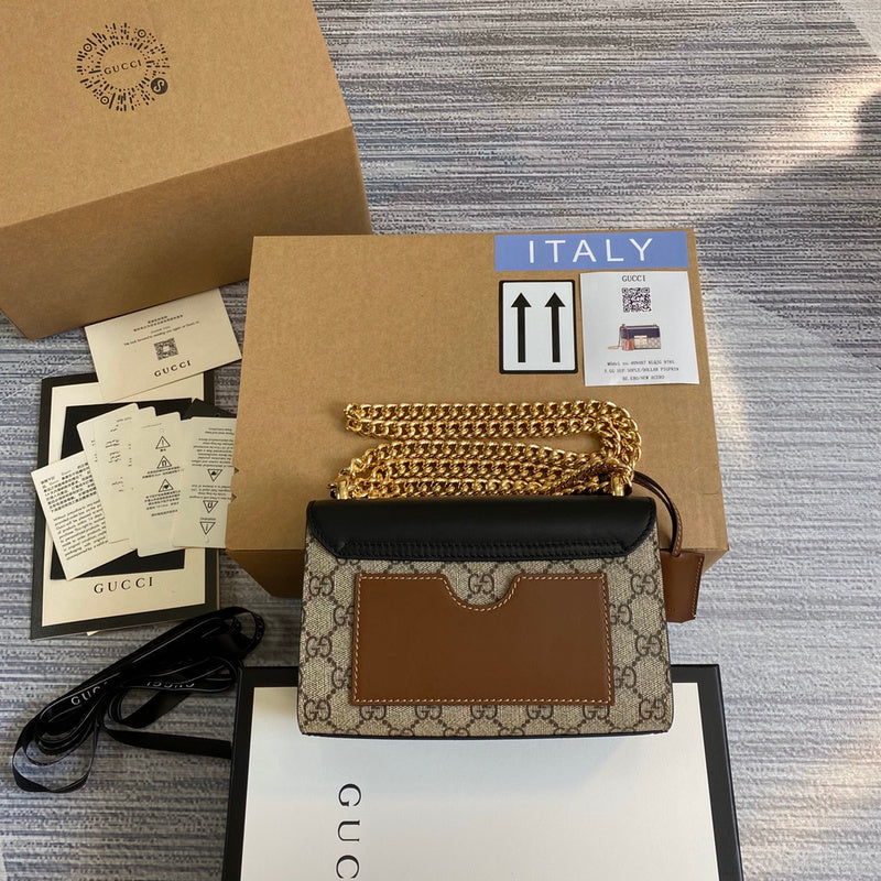 Front view of chic structured women's handbag – women's luxury accessory