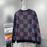 Side profile of Louis Vuitton luxury clothing with label-forward styling