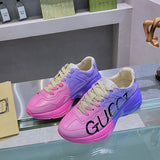 Gucci Designer sneakers in fresh white-and-black signature lace-up style front view