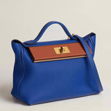 Side view of tailored structured handbag